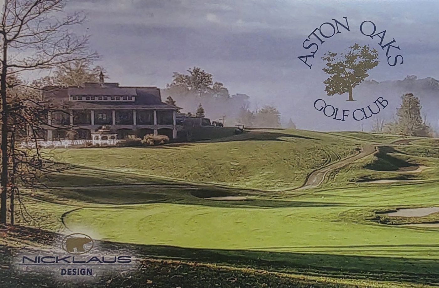 Aston Oaks Golf Club clubhouse above the fairway, from the scorecard cover